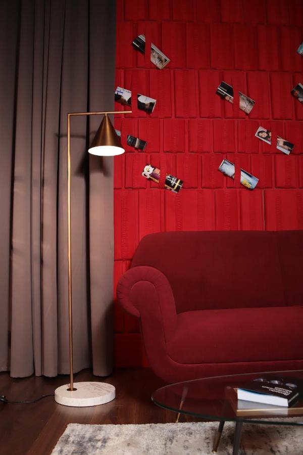 The Veil Hotel Astana Exterior foto A 3D rendering of a room with a red wall