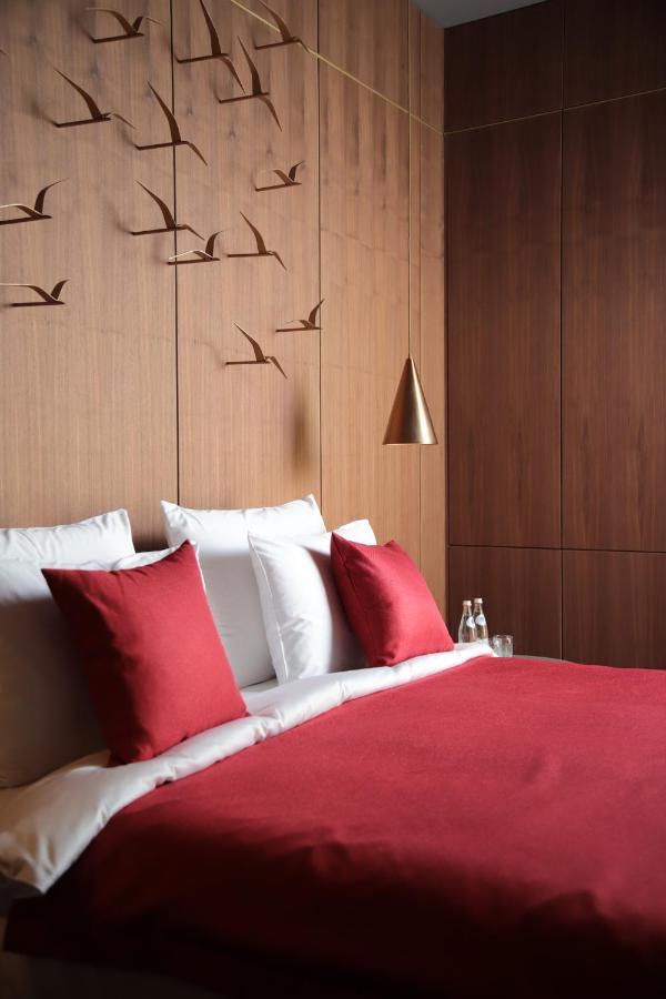 The Veil Hotel Astana Exterior foto A bed with cushions