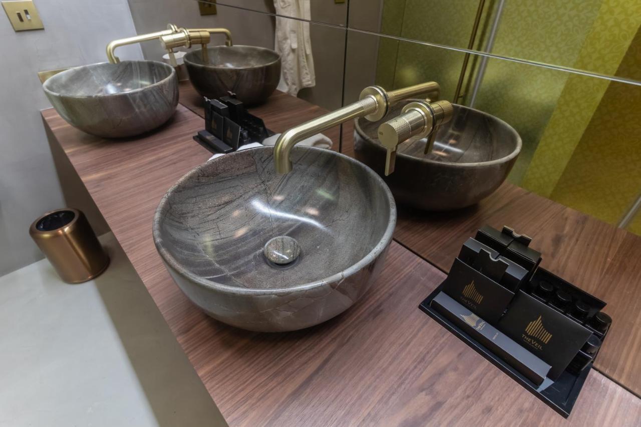 The Veil Hotel Astana Exterior foto Bathroom sinks