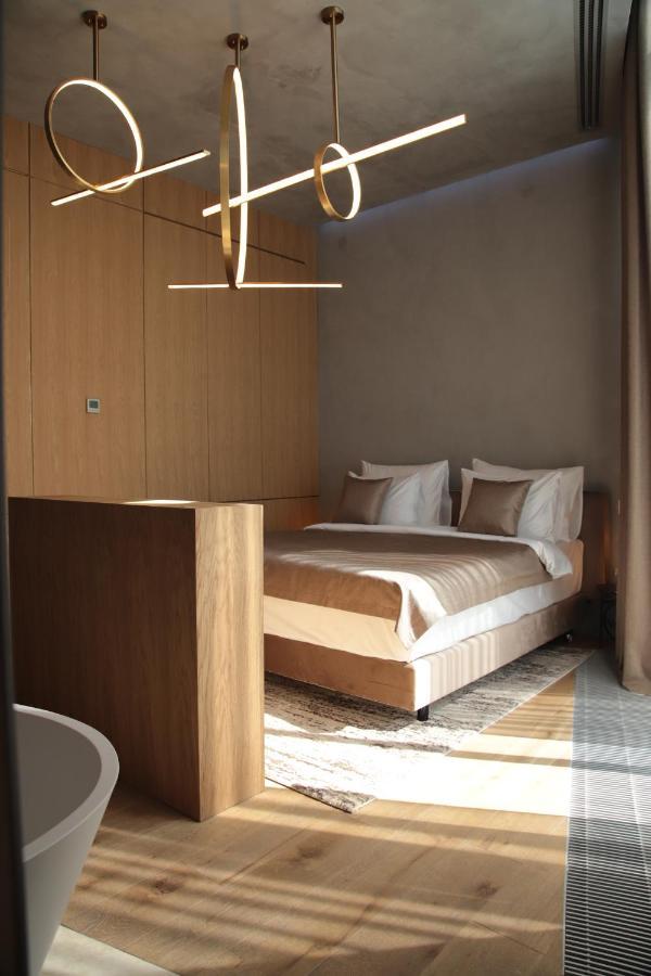 The Veil Hotel Astana Exterior foto A bedroom at the hotel